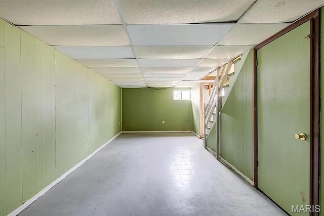 675 Pimlico Dr, Florissant, MO 63033 - below grade area featuring a paneled ceiling and stairs