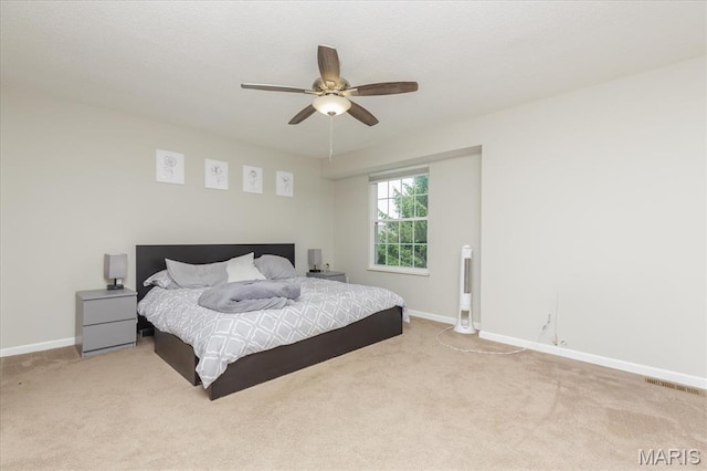 23 Trailside Ct Unit 2, Saint Peters, MO 63303 - carpeted bedroom featuring baseboards and ceiling fan