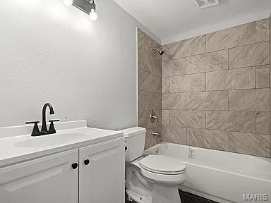 1412 N Olive St, Mexico, MO 65265 - bathroom with vanity and shower / bath combination