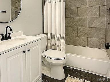 1412 N Olive St, Mexico, MO 65265 - full bathroom with vanity and shower / bath combo with shower curtain