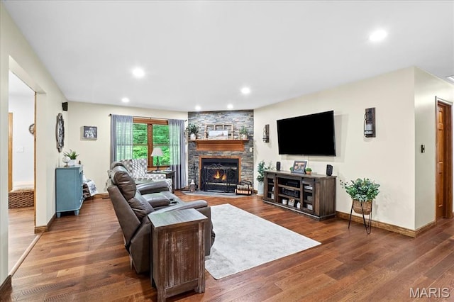 13345 Iberg Rd, Highland, IL 62249 - living room featuring wood finished floors, a fireplace, and recessed lighting