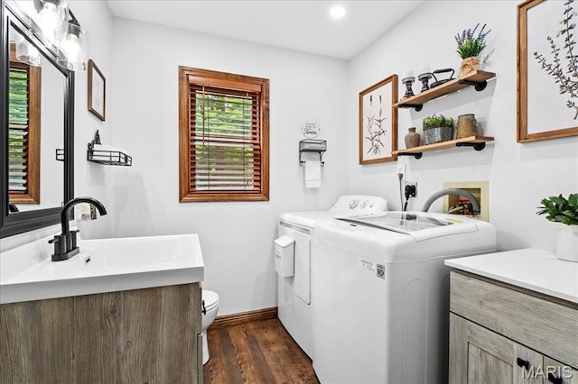 13345 Iberg Rd, Highland, IL 62249 - washroom with independent washer and dryer, dark wood-type flooring, and recessed lighting
