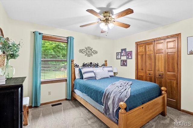 13345 Iberg Rd, Highland, IL 62249 - bedroom with carpet, a closet, and a ceiling fan