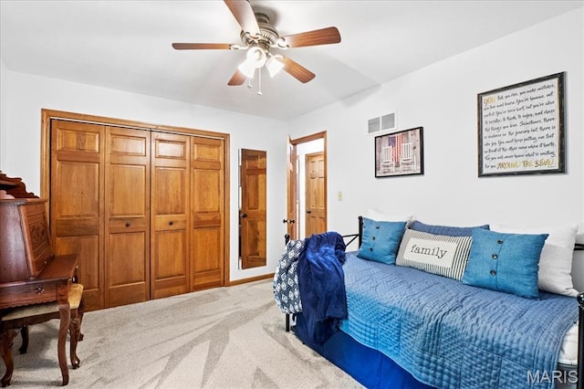13345 Iberg Rd, Highland, IL 62249 - bedroom with carpet, a ceiling fan, and a closet
