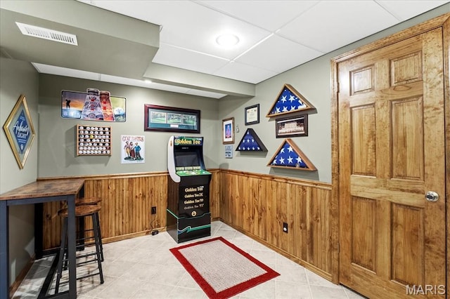 13345 Iberg Rd, Highland, IL 62249 - bar featuring a wainscoted wall, light tile patterned floors, and wooden walls