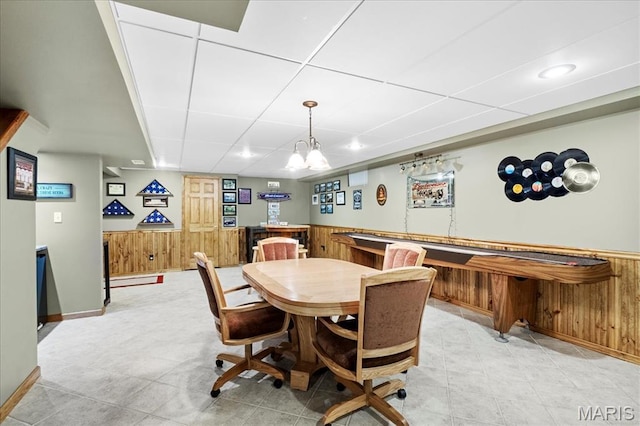 13345 Iberg Rd, Highland, IL 62249 - dining room featuring wooden walls, wainscoting, recessed lighting, and a drop ceiling