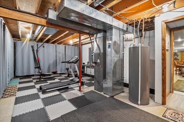 13345 Iberg Rd, Highland, IL 62249 - unfinished below grade area with water heater and heating unit