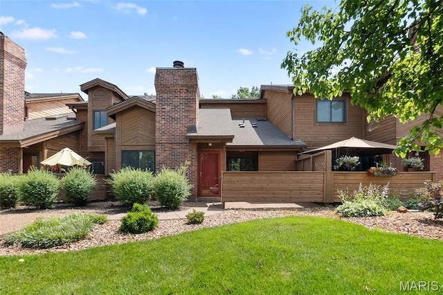 856 Hemingway Ln Unit D, Weldon Spring, MO 63304 - back of property with a chimney
