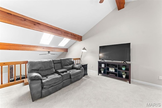 856 Hemingway Ln Unit D, Weldon Spring, MO 63304 - carpeted living room featuring a ceiling fan, a skylight, beamed ceiling, and high vaulted ceiling