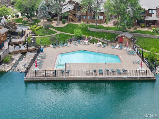 856 Hemingway Ln Unit D, Weldon Spring, MO 63304 - community pool featuring a water view