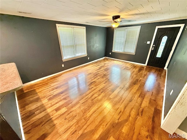 904 Vernon St, Farmington, MO 63640 - entrance foyer with ceiling fan, hardwood / wood-style floors, and crown molding