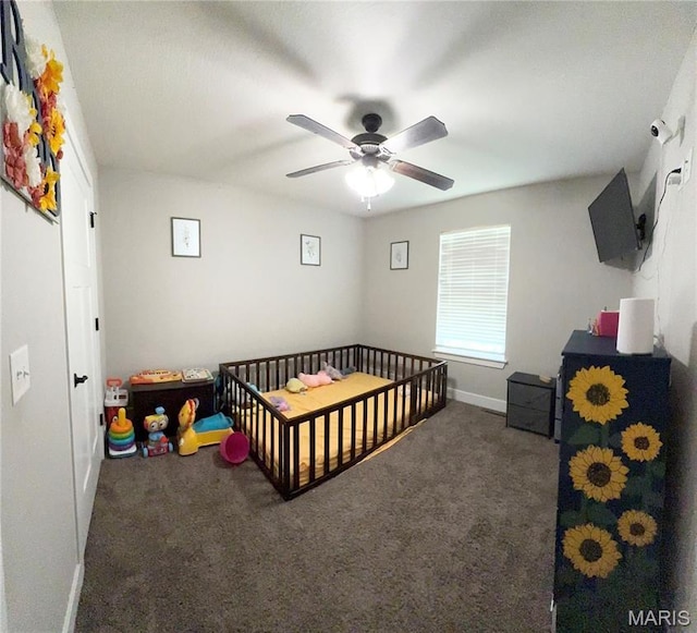 22115 Royce Ln, Waynesville, MO 65583 - bedroom featuring carpet flooring, a crib, and ceiling fan