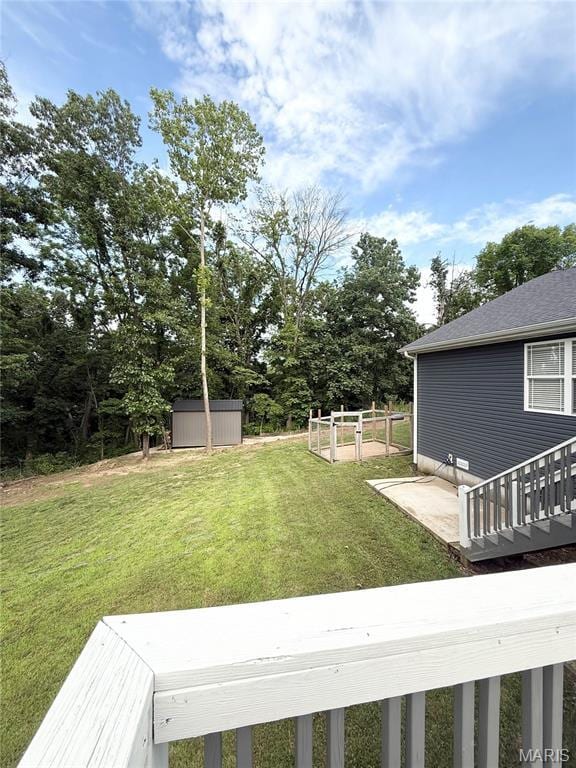 22115 Royce Ln, Waynesville, MO 65583 - view of grassy yard with a storage shed