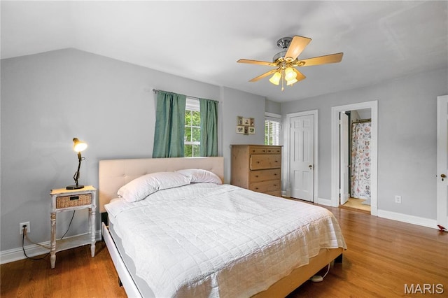 1000 Diversey Dr, Crestwood, MO 63126 - bedroom with wood finished floors, a ceiling fan, and lofted ceiling