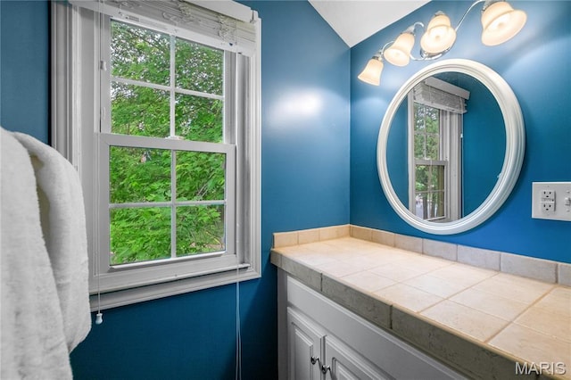 1000 Diversey Dr, Crestwood, MO 63126 - bathroom featuring vanity and lofted ceiling