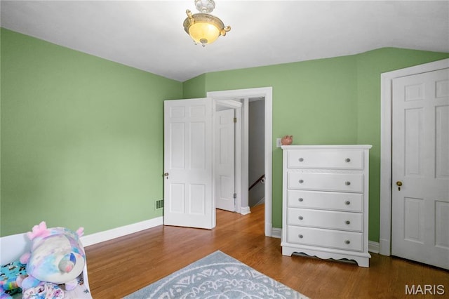 1000 Diversey Dr, Crestwood, MO 63126 - bedroom featuring wood finished floors and baseboards