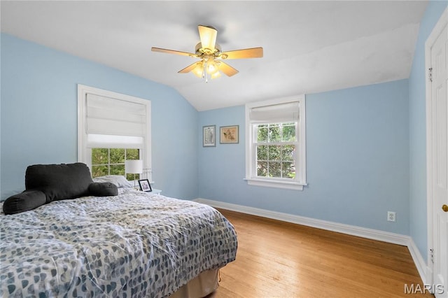 1000 Diversey Dr, Crestwood, MO 63126 - bedroom with vaulted ceiling, wood finished floors, and a ceiling fan