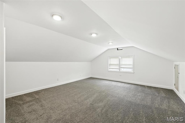 9441 Ridge Ave, Overland, MO 63114 - bonus room with dark colored carpet and vaulted ceiling