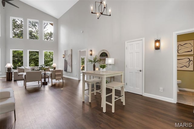3516 Hawthorne Ridge Dr, Eureka, MO 63025 - dining space featuring high vaulted ceiling, a chandelier, dark wood finished floors, and ceiling fan