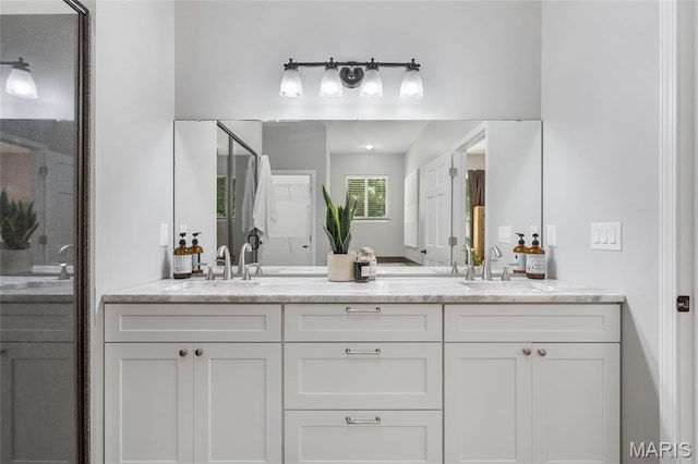 3516 Hawthorne Ridge Dr, Eureka, MO 63025 - bathroom with double vanity and a shower with door