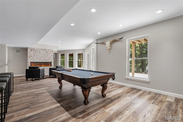 3516 Hawthorne Ridge Dr, Eureka, MO 63025 - game room featuring plenty of natural light, wood finished floors, recessed lighting, a fireplace, and billiards table