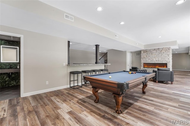 3516 Hawthorne Ridge Dr, Eureka, MO 63025 - recreation room featuring wood finished floors, billiards table, a fireplace, and recessed lighting
