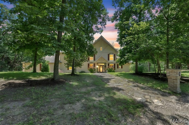3516 Hawthorne Ridge Dr, Eureka, MO 63025 - view of property hidden behind natural elements featuring stucco siding
