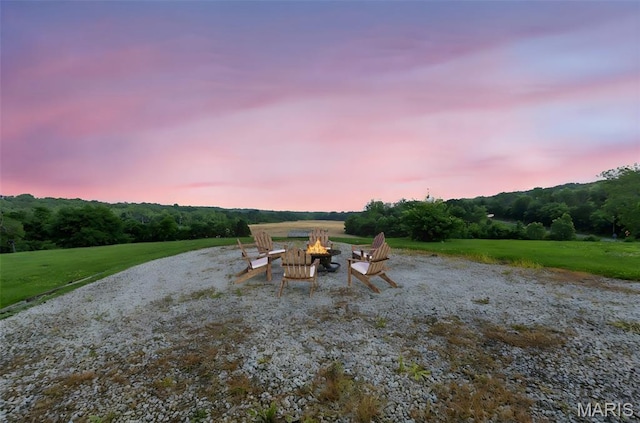 5701 State Road P, De Soto, MO 63020 - view of patio featuring a fire pit and a forest view