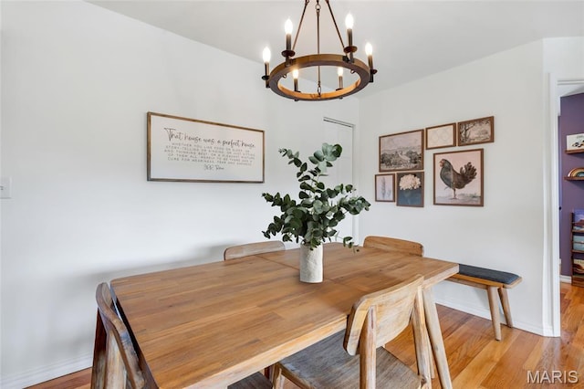 5701 State Road P, De Soto, MO 63020 - dining room featuring a chandelier and light wood finished floors