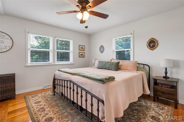 5701 State Road P, De Soto, MO 63020 - bedroom with wood finished floors and a ceiling fan