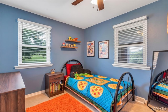 5701 State Road P, De Soto, MO 63020 - bedroom with carpet, multiple windows, and a ceiling fan