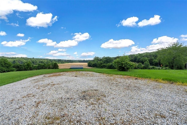 5701 State Road P, De Soto, MO 63020 - view of yard featuring a wooded view and a view of countryside