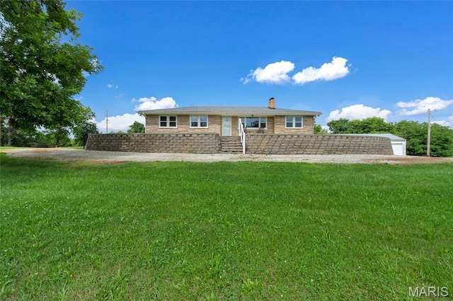 5701 State Road P, De Soto, MO 63020 - view of front of home featuring a front lawn and a chimney