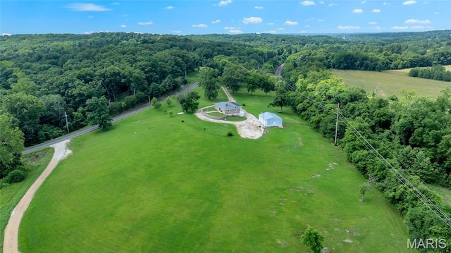 5701 State Road P, De Soto, MO 63020 - aerial view of sparsely populated area with a heavily wooded area