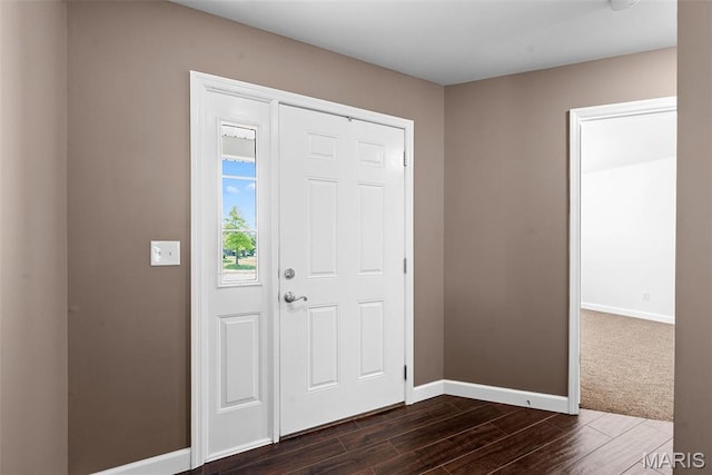 107 Piety Dr, Lake St Louis, MO 63367 - foyer with dark wood-style floors and baseboards