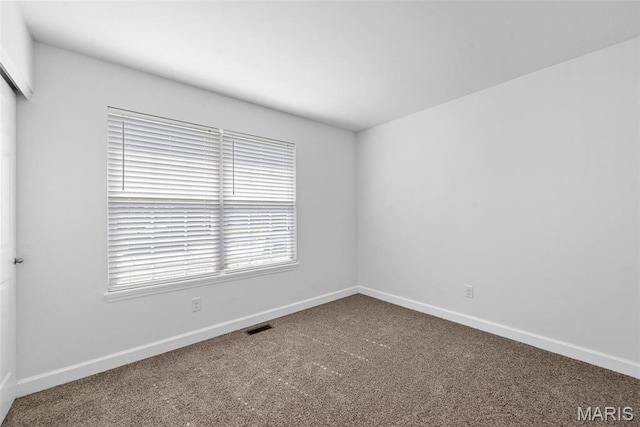 107 Piety Dr, Lake St Louis, MO 63367 - carpeted empty room with baseboards