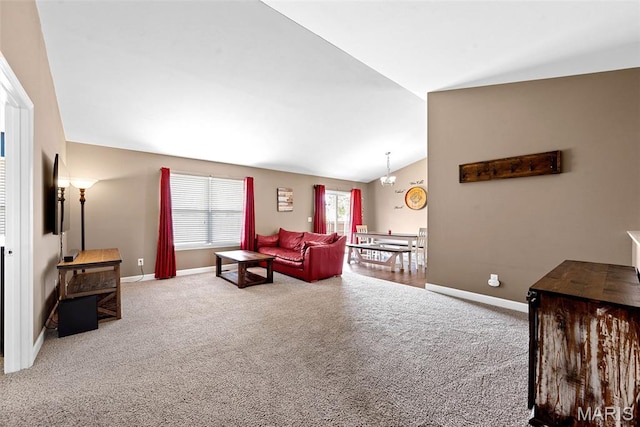 107 Piety Dr, Lake St Louis, MO 63367 - carpeted living area with vaulted ceiling and baseboards