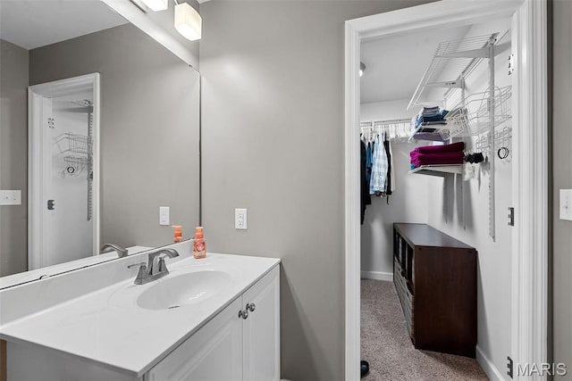 107 Piety Dr, Lake St Louis, MO 63367 - bathroom with vanity and baseboards