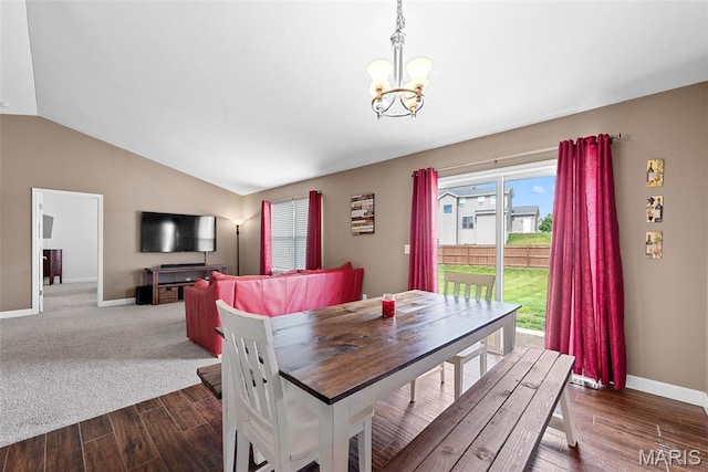 107 Piety Dr, Lake St Louis, MO 63367 - dining area with a chandelier, vaulted ceiling, and wood finished floors