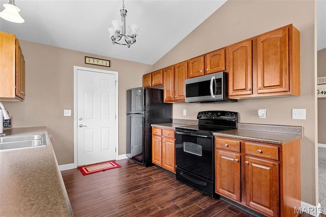 107 Piety Dr, Lake St Louis, MO 63367 - kitchen featuring black appliances, a chandelier, dark wood-style flooring, vaulted ceiling, and brown cabinetry
