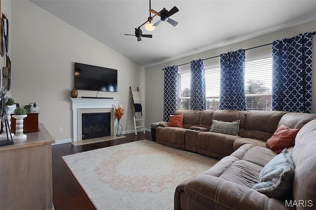 234 Lonepine Dr, Wentzville, MO 63385 - living area featuring a ceiling fan, vaulted ceiling, hardwood / wood-style floors, and a fireplace with flush hearth