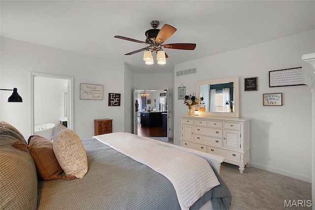 234 Lonepine Dr, Wentzville, MO 63385 - carpeted bedroom with connected bathroom and a ceiling fan