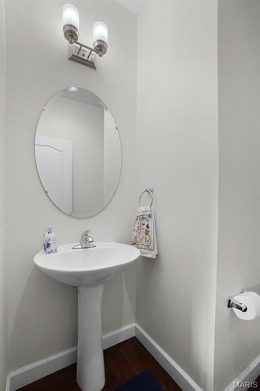 234 Lonepine Dr, Wentzville, MO 63385 - bathroom with baseboards and a sink