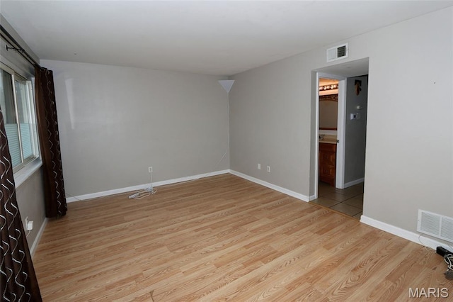 10640 Carroll Wood Way, Saint Louis, MO 63128 - unfurnished room with light wood-style flooring and baseboards