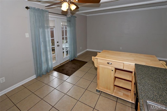 10640 Carroll Wood Way, Saint Louis, MO 63128 - spare room featuring french doors, a ceiling fan, and light tile patterned flooring