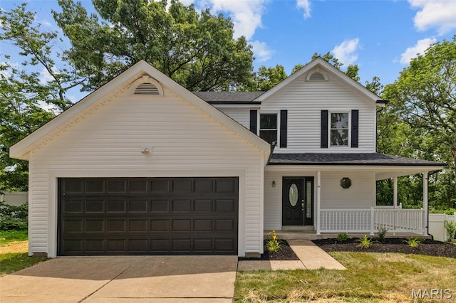 145 Aspencade Cir, Saint Peters, MO 63376 - view of front of property with covered porch, an attached garage, and concrete driveway