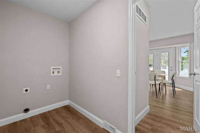145 Aspencade Cir, Saint Peters, MO 63376 - washroom featuring electric dryer hookup, hookup for a washing machine, and wood finished floors