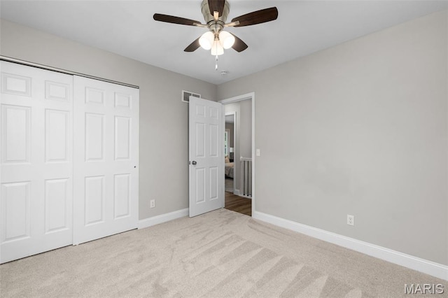 145 Aspencade Cir, Saint Peters, MO 63376 - unfurnished bedroom with carpet, a closet, and a ceiling fan