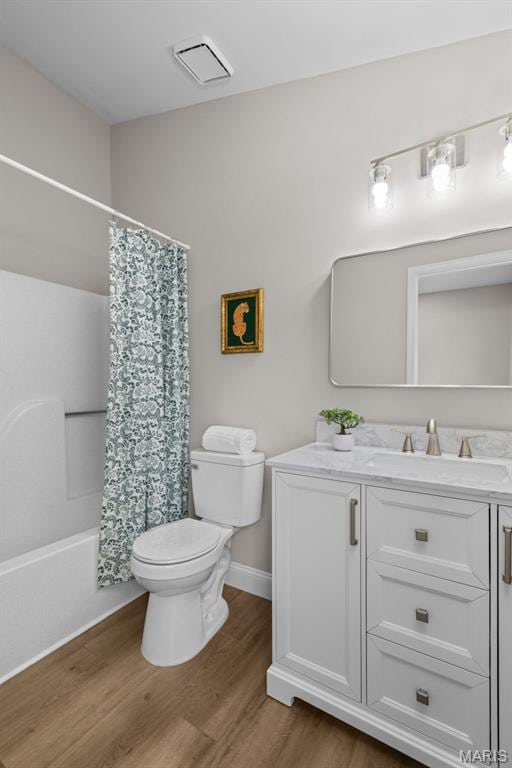 145 Aspencade Cir, Saint Peters, MO 63376 - bathroom with vanity, wood finished floors, and shower / bath combination with curtain
