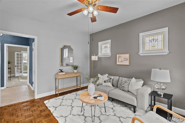 5524 Devonshire Ave, Saint Louis, MO 63109 - living room featuring baseboards and a ceiling fan